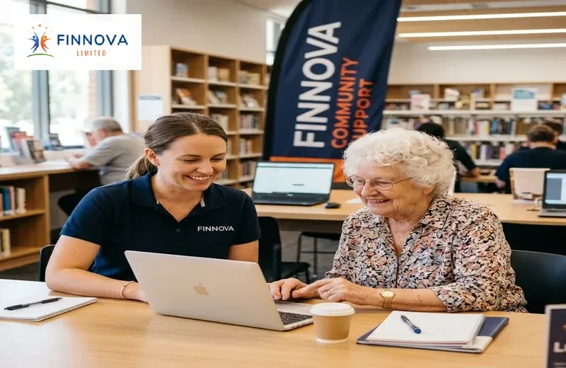 Volunteer helping with digital literacy